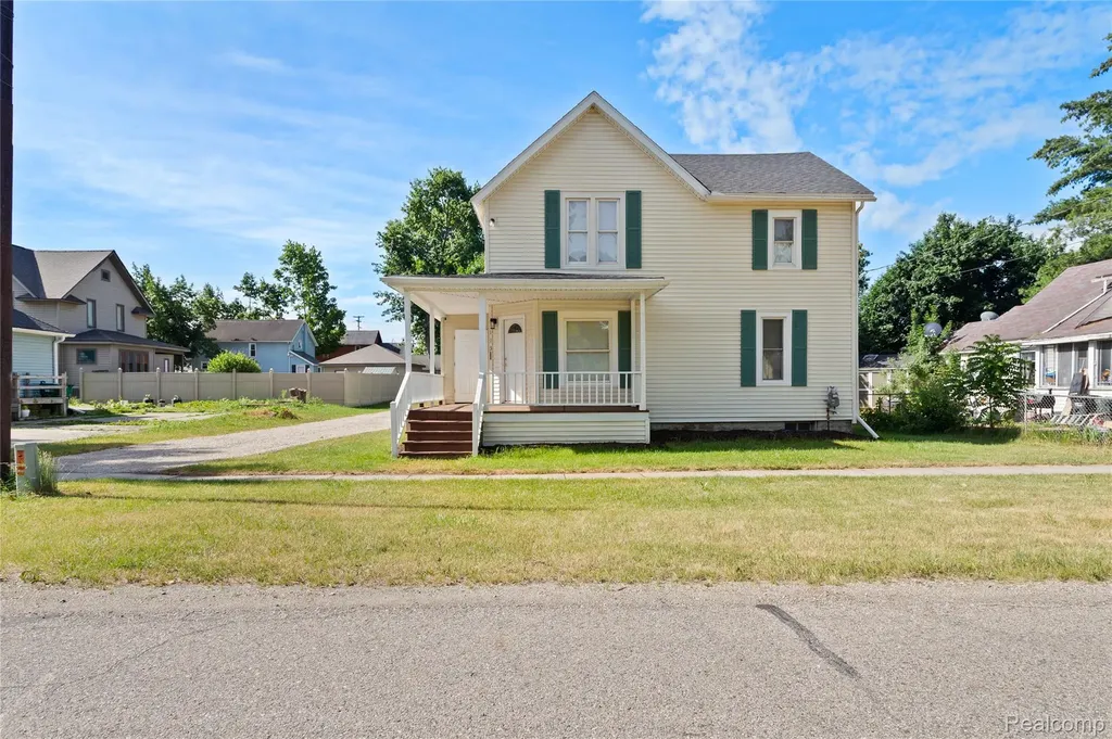 113 W Polly Street Perry City MI 48872