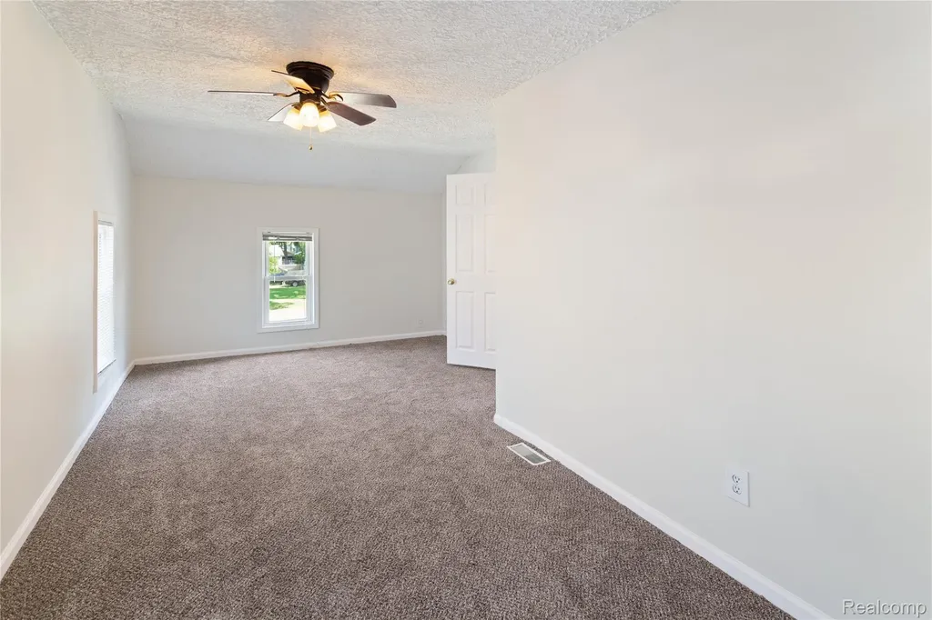 113 W Polly Street Perry City MI 48872