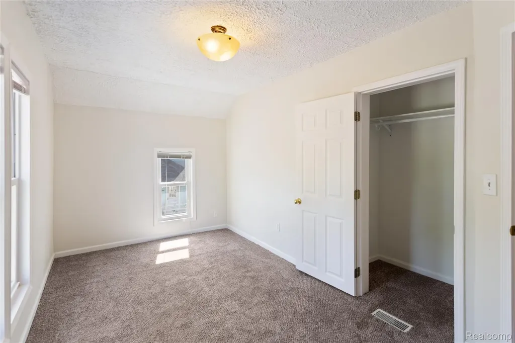 113 W Polly Street Perry City MI 48872