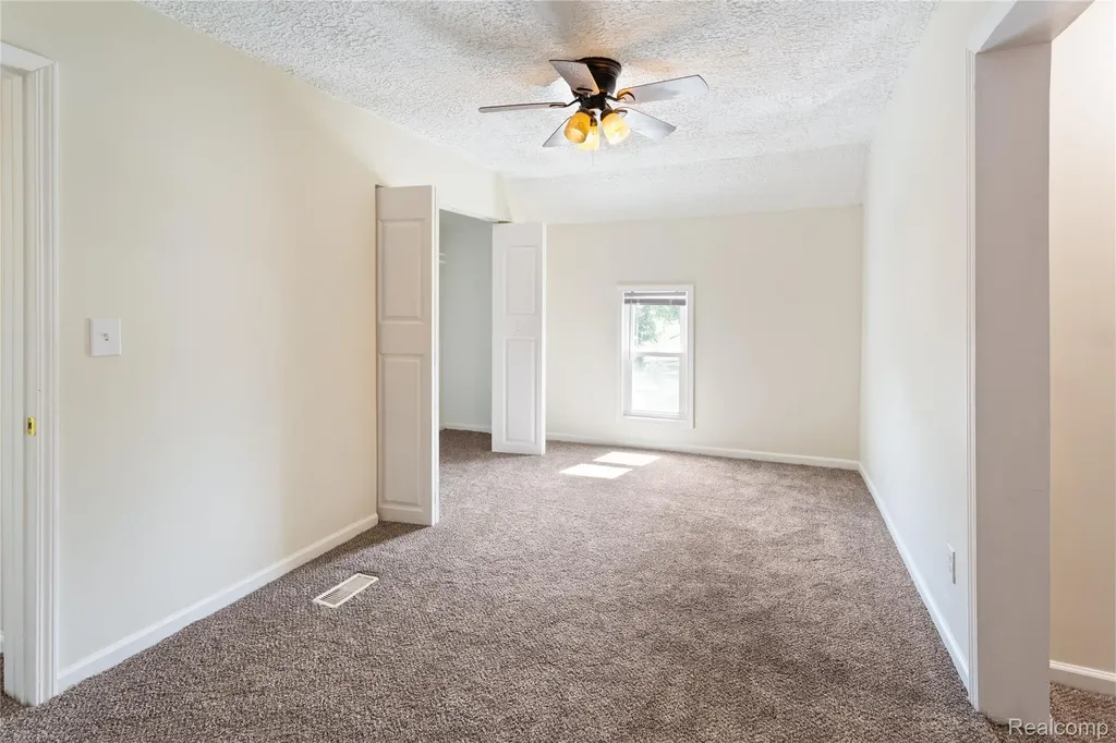 113 W Polly Street Perry City MI 48872