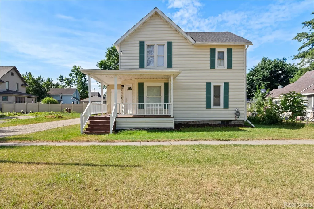 113 W Polly Street Perry City MI 48872