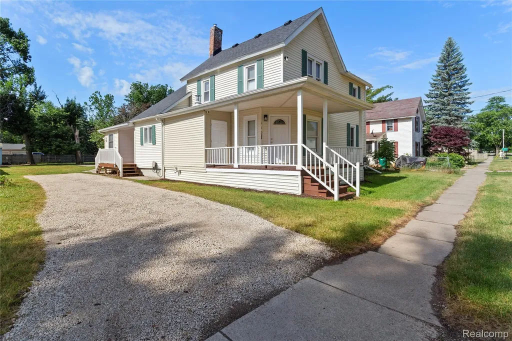 113 W Polly Street Perry City MI 48872