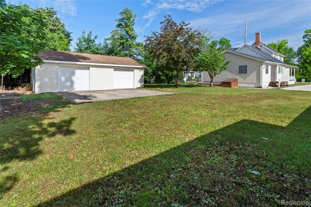 113 W Polly Street Perry City MI 48872