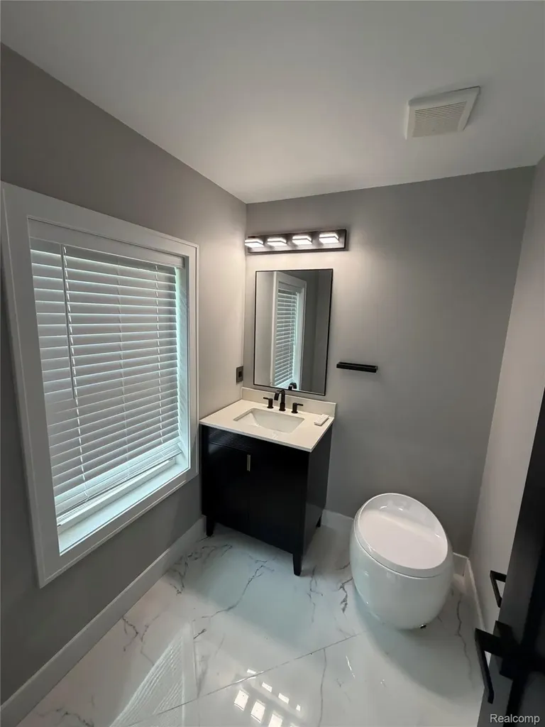 561 E Walled Lake Drive Walled Lake City MI 48390