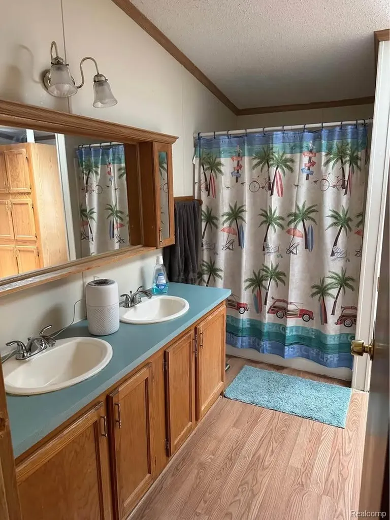 831 N Pontiac Trail Walled Lake City MI 48390