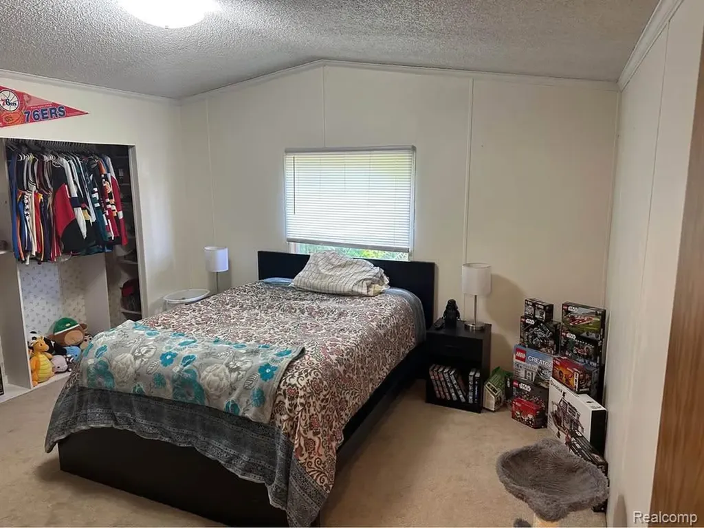 831 N Pontiac Trail Walled Lake City MI 48390
