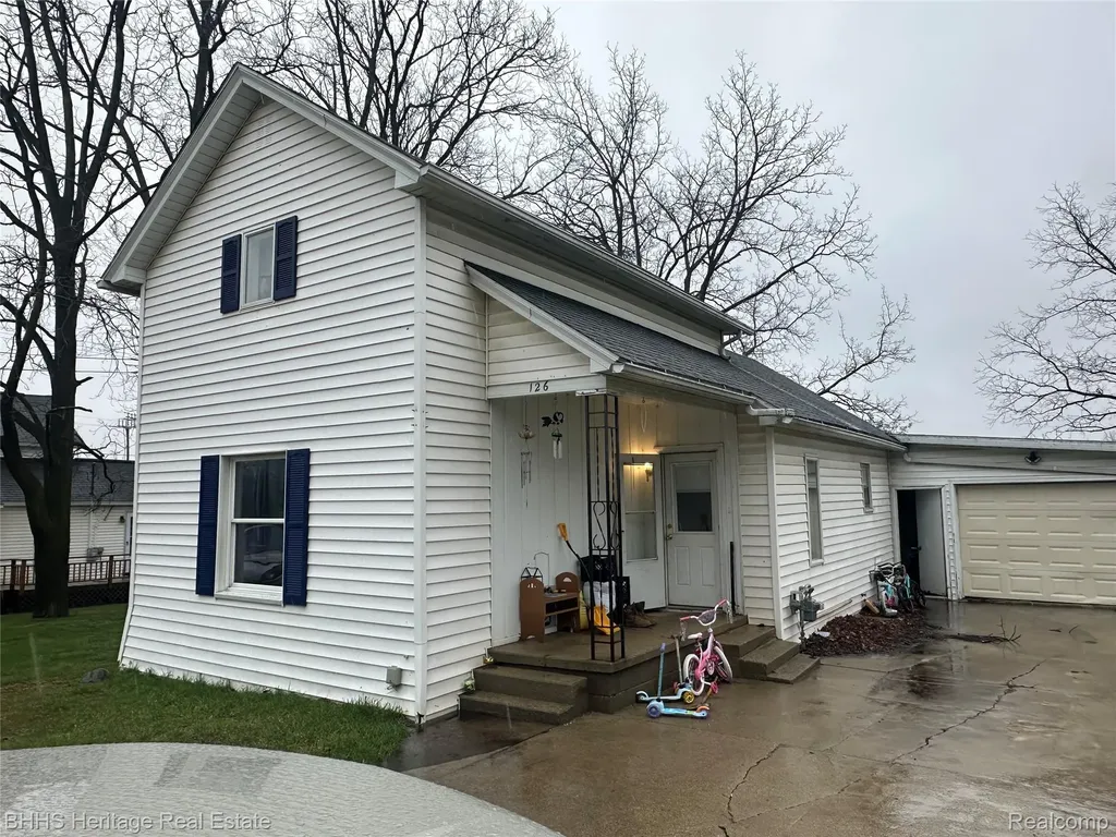 126 W Mason Morrice Village MI 48857