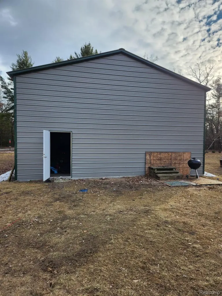 5743 S Merrillville Road Webber Township MI 49304