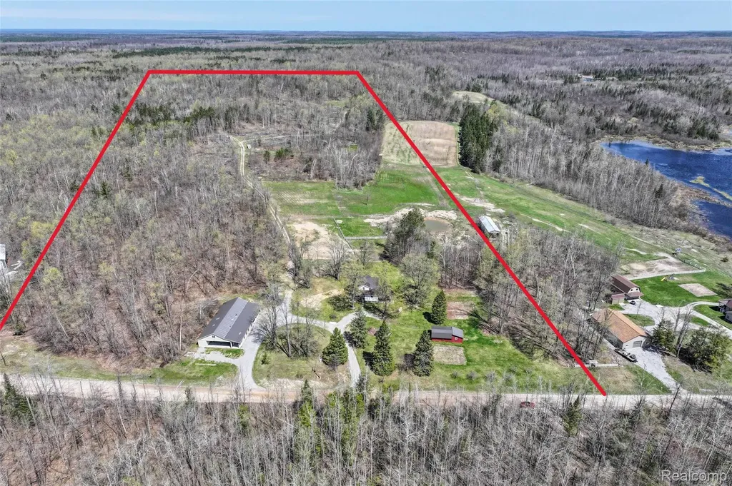1064 W Helmer Lake Road Elmer Township MI 48647