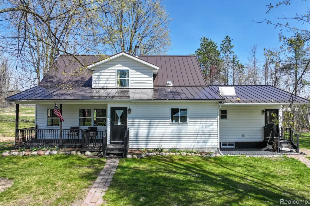 1064 W Helmer Lake Road Elmer Township MI 48647