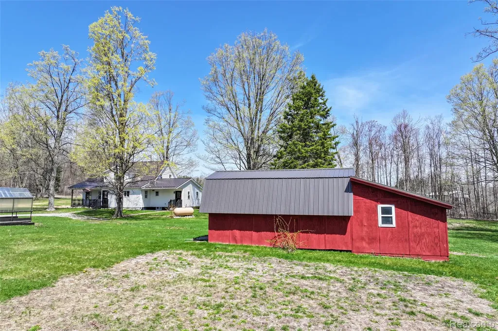 1064 W Helmer Lake Road Elmer Township MI 48647