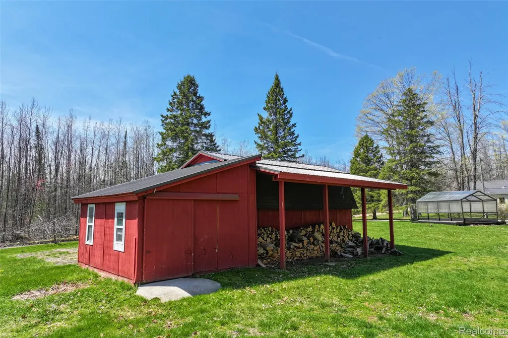 1064 W Helmer Lake Road Elmer Township MI 48647