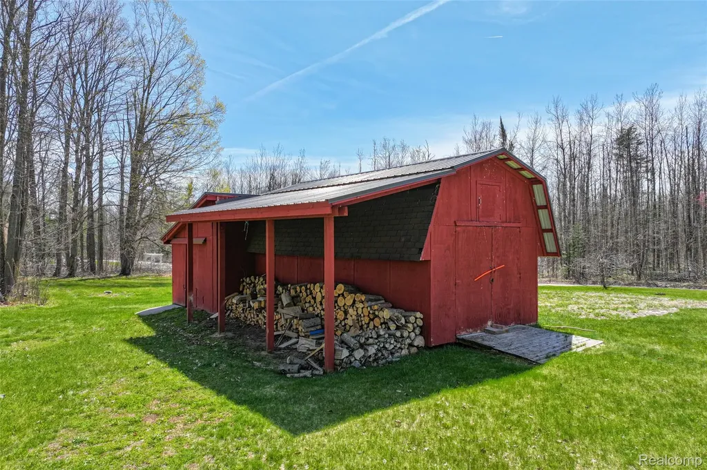 1064 W Helmer Lake Road Elmer Township MI 48647