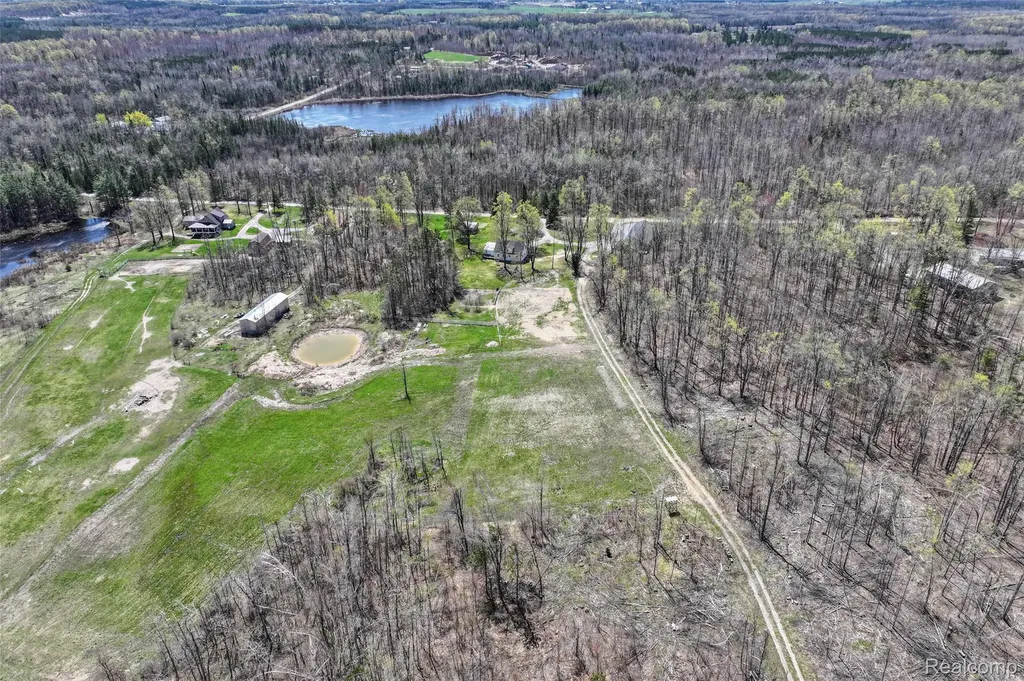 1064 W Helmer Lake Road Elmer Township MI 48647