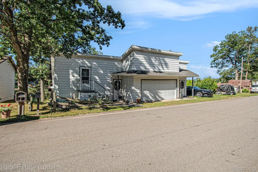 1734 Forest Road Harrison City MI 48625