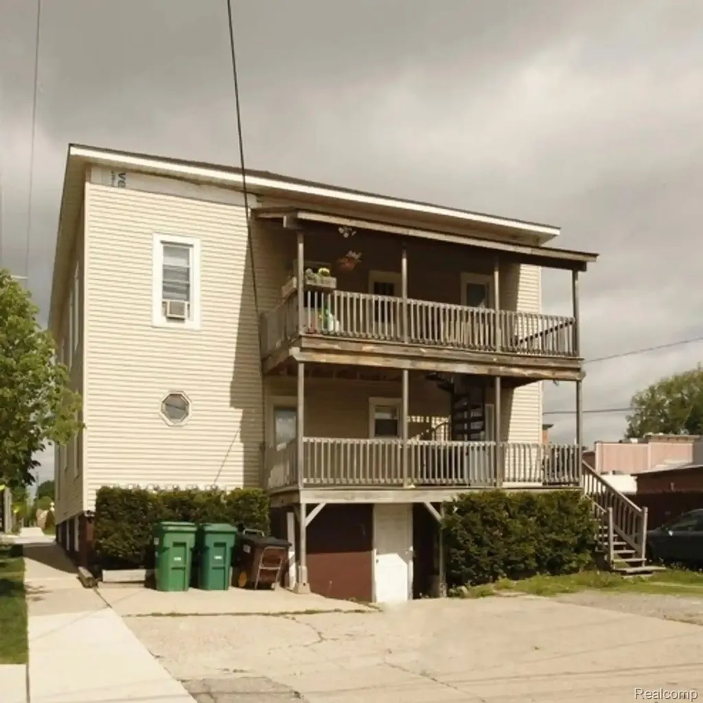 121 S Court Street Howell City MI 48843