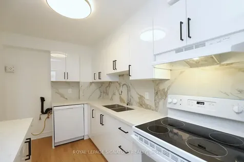 3 Massey Square Toronto ON M4C 5L5