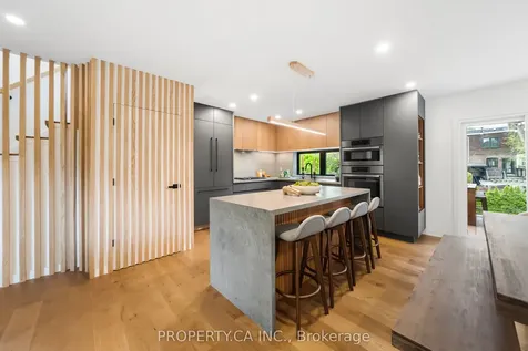 9 Maughan Crescent Toronto ON M4L 3E4