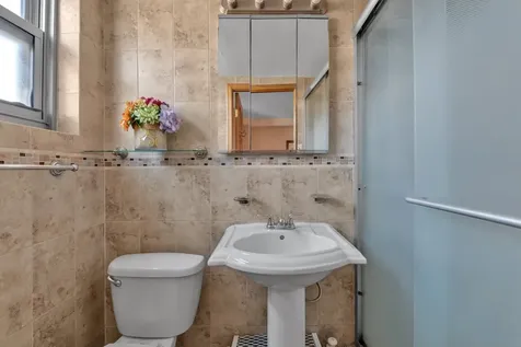 61-15 97th Street New York City NY 11374