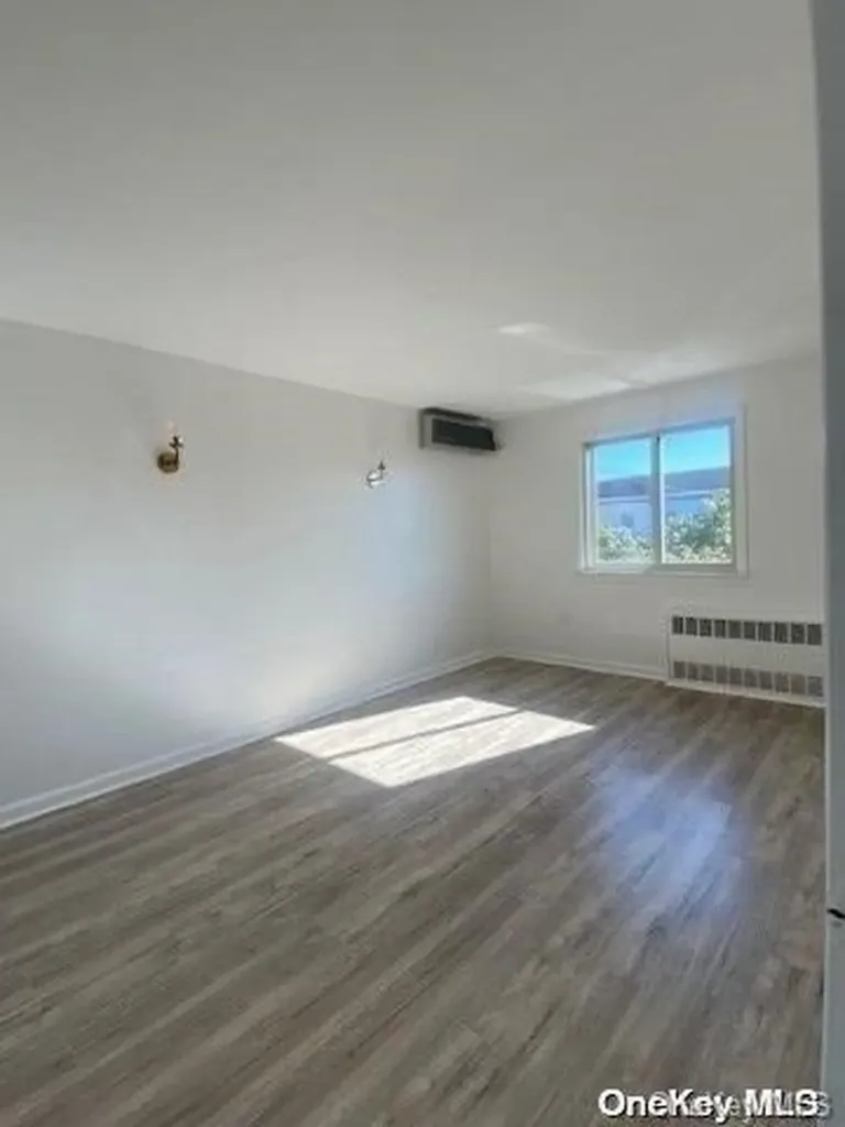 48-42 58th Lane Woodside NY 11377