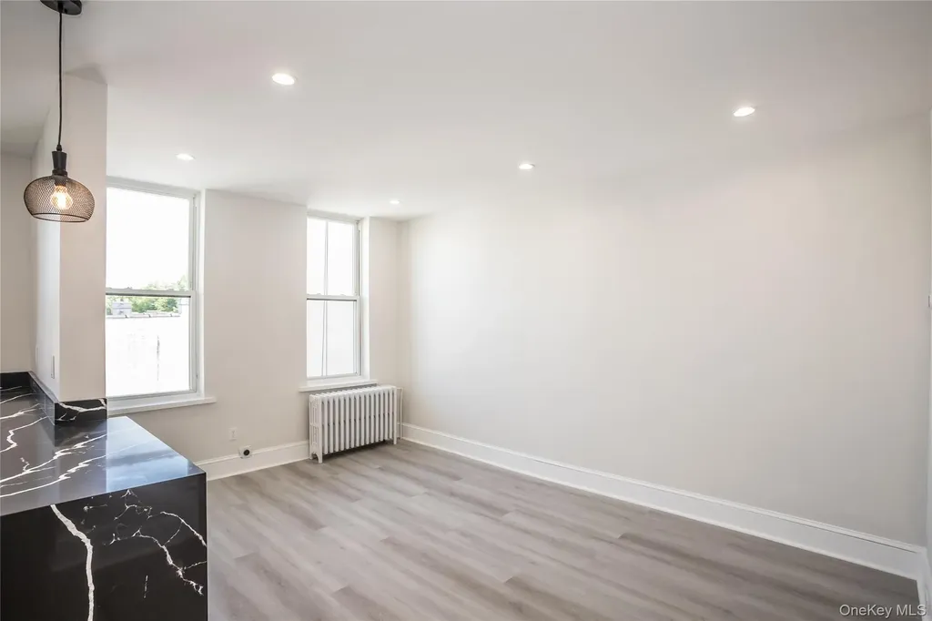 67-17 Myrtle Avenue Glendale NY 11385