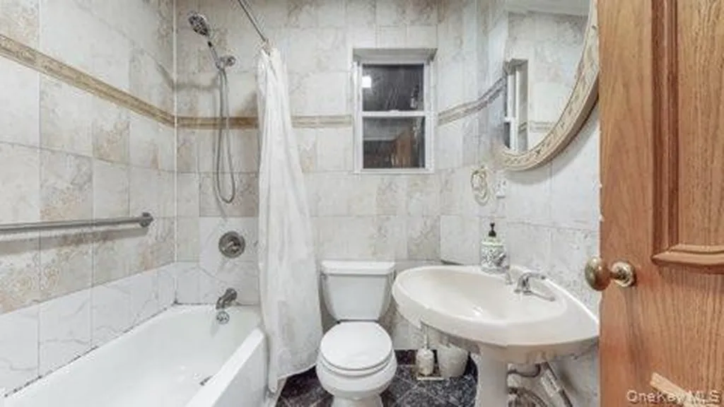 44-32 64 Street Woodside NY 11377