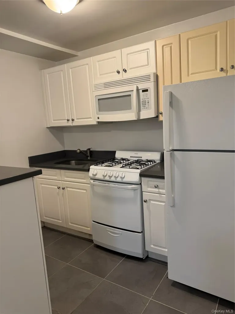 83-21 Lefferts Boulevard Kew Gardens NY 11415