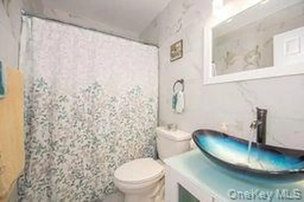 63 E Tiana Road Hampton Bays NY 11946