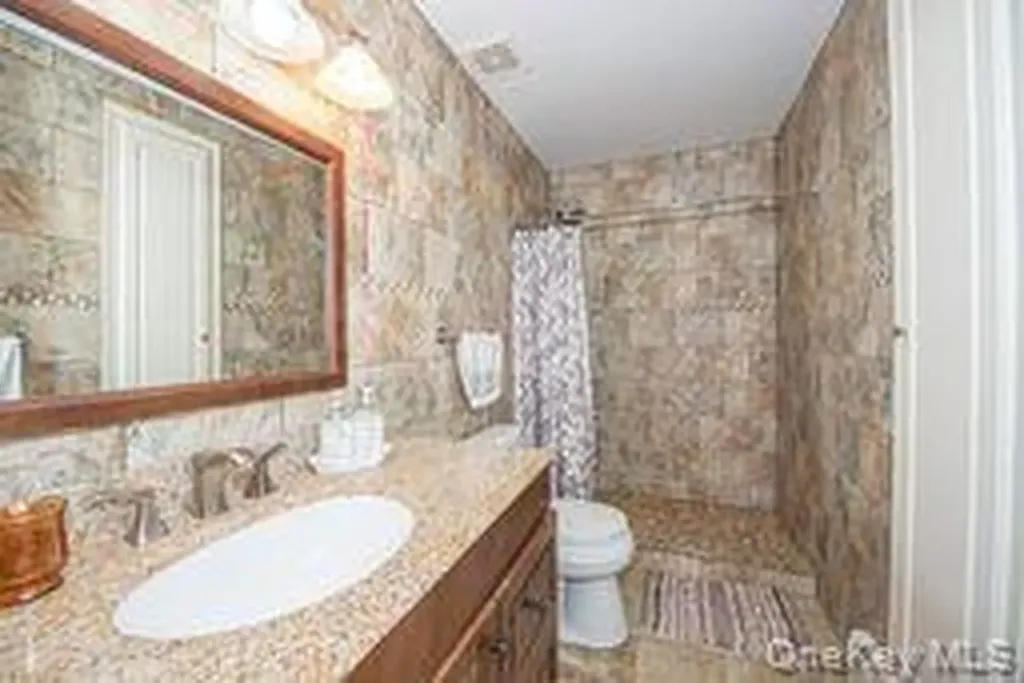 63 E Tiana Road Hampton Bays NY 11946