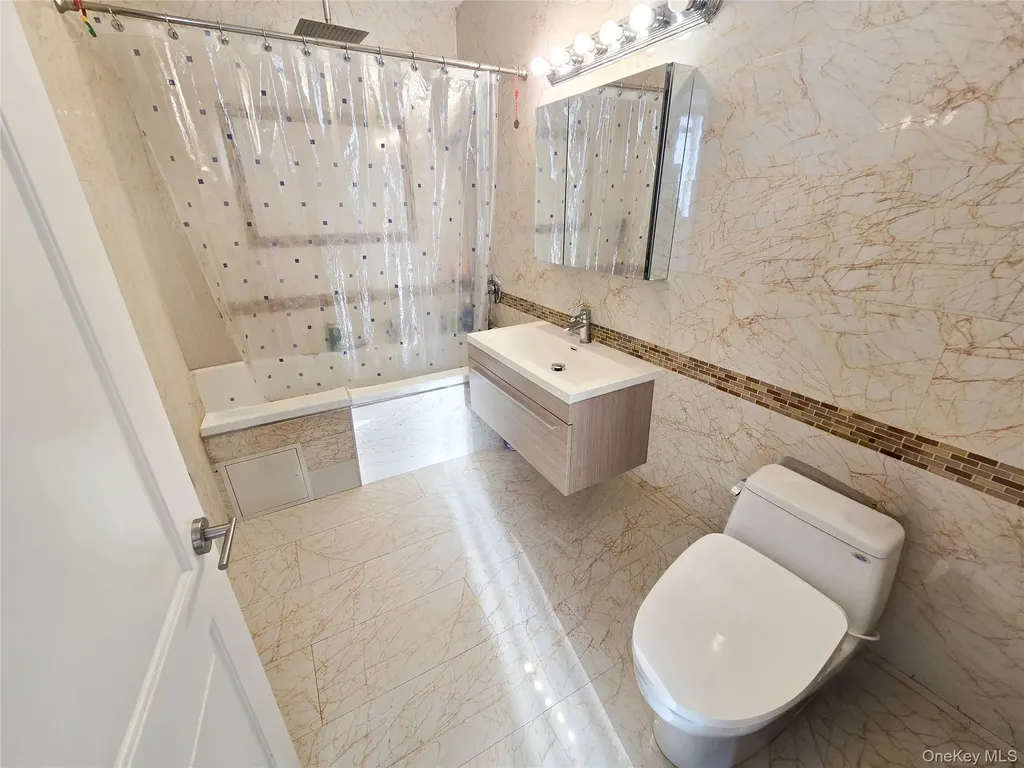 63-36 99 Sreet Rego Park NY 11374