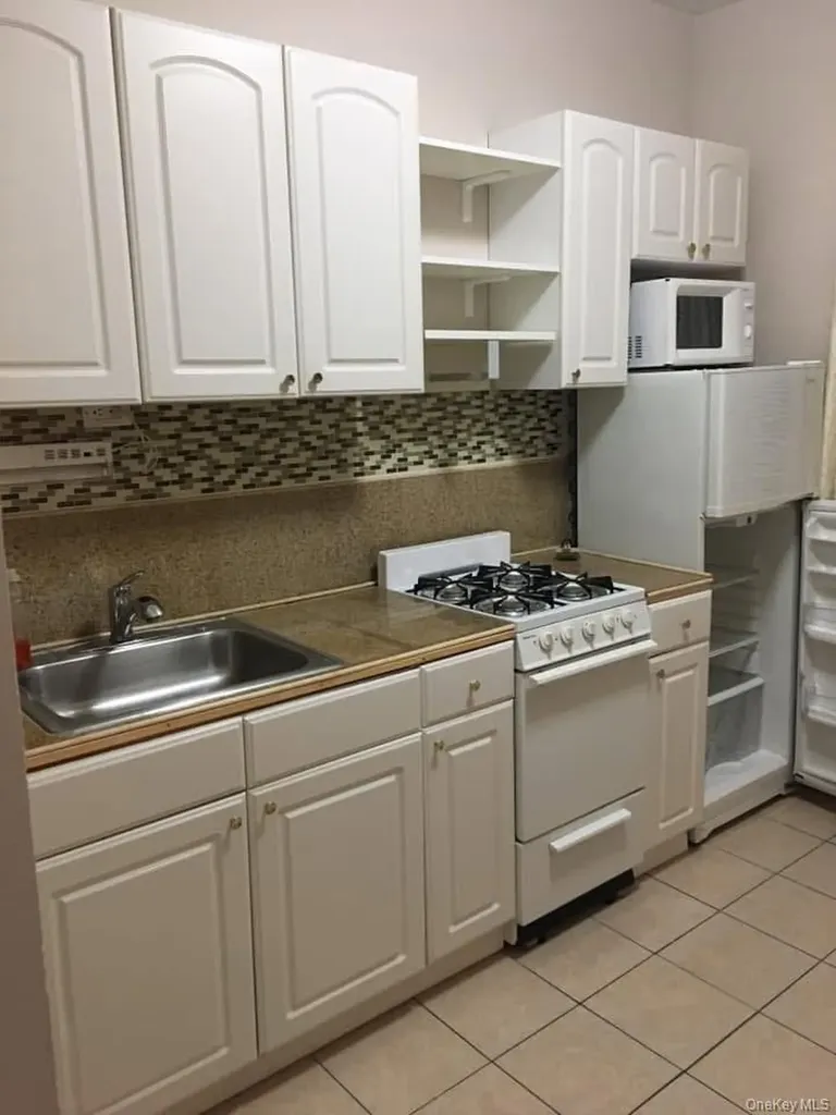 6017 80th Avenue Glendale NY 11385