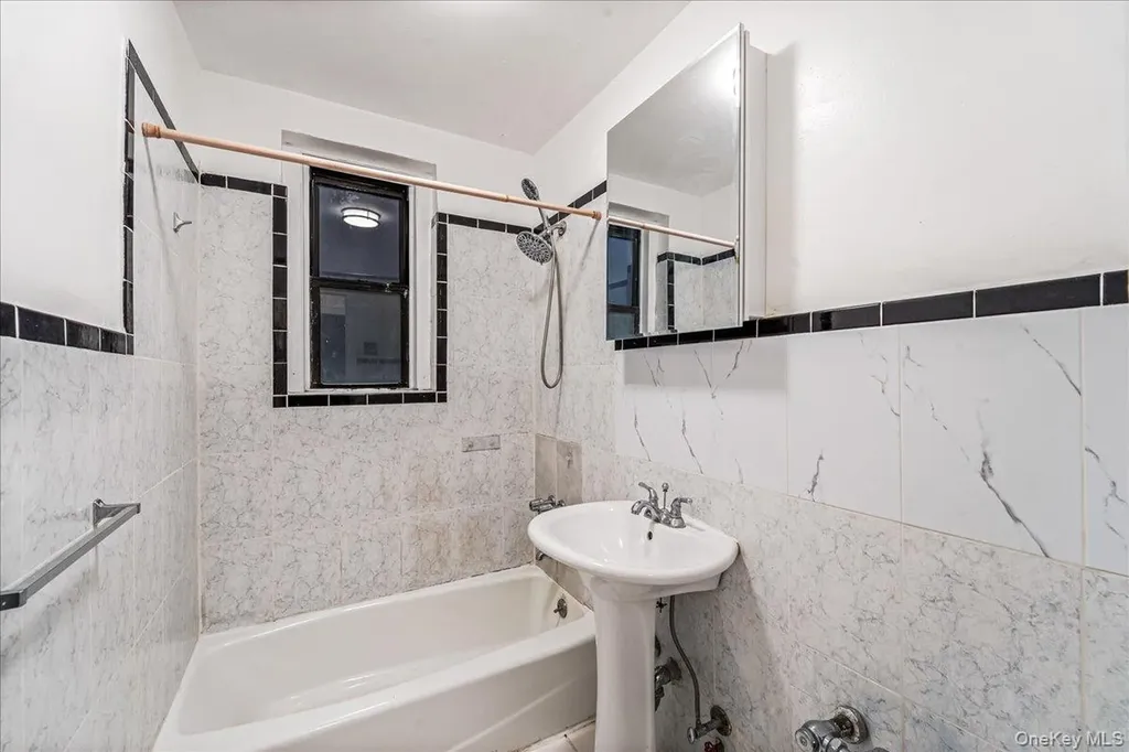 61-40 Saunders Rego Park NY 11374
