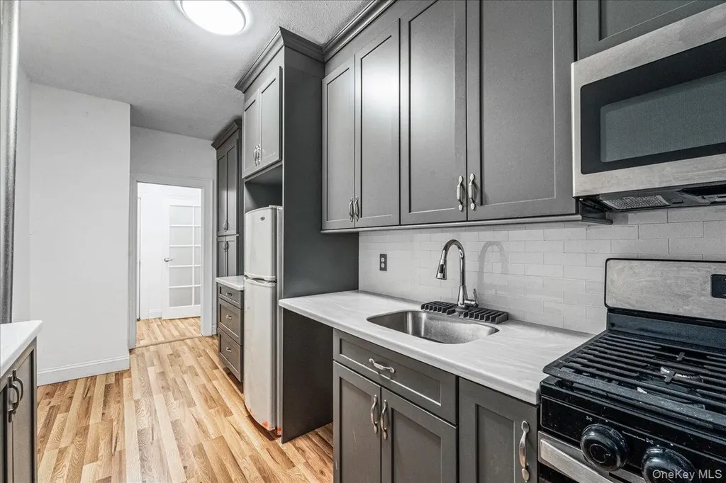 61-40 Saunders Rego Park NY 11374
