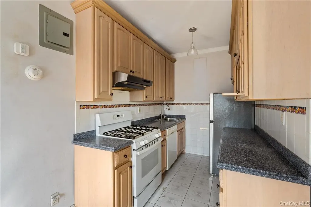 85-11 Lefferts Boulevard Kew Gardens NY 11415