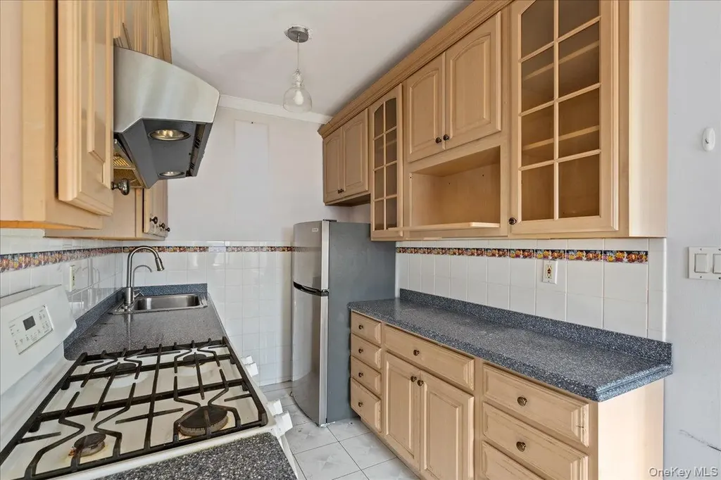 85-11 Lefferts Boulevard Kew Gardens NY 11415