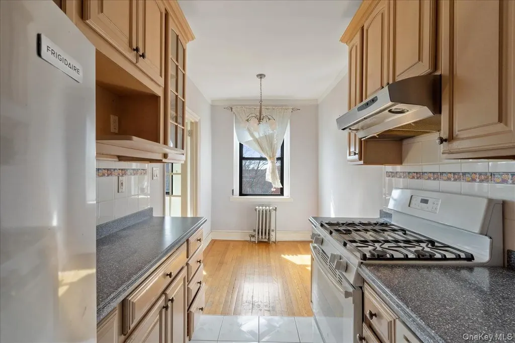 85-11 Lefferts Boulevard Kew Gardens NY 11415