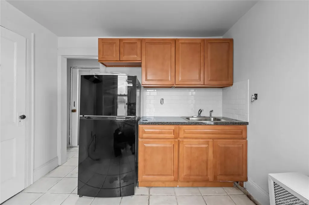 126-19 Sutter Avenue South Ozone Park NY 11420