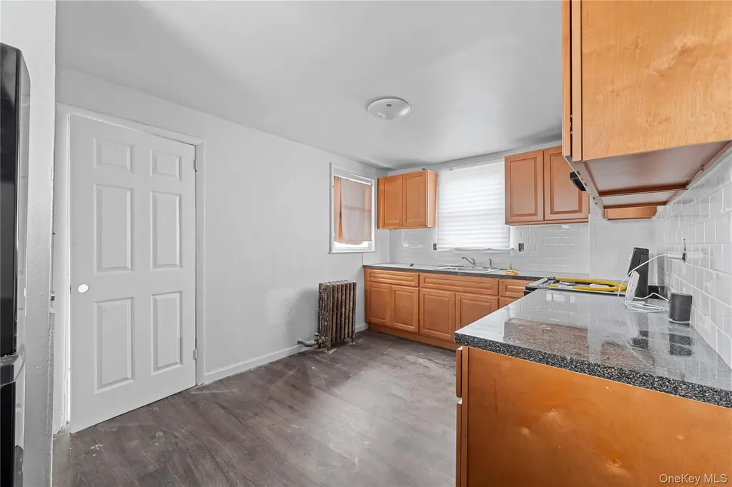 126-19 Sutter Avenue South Ozone Park NY 11420