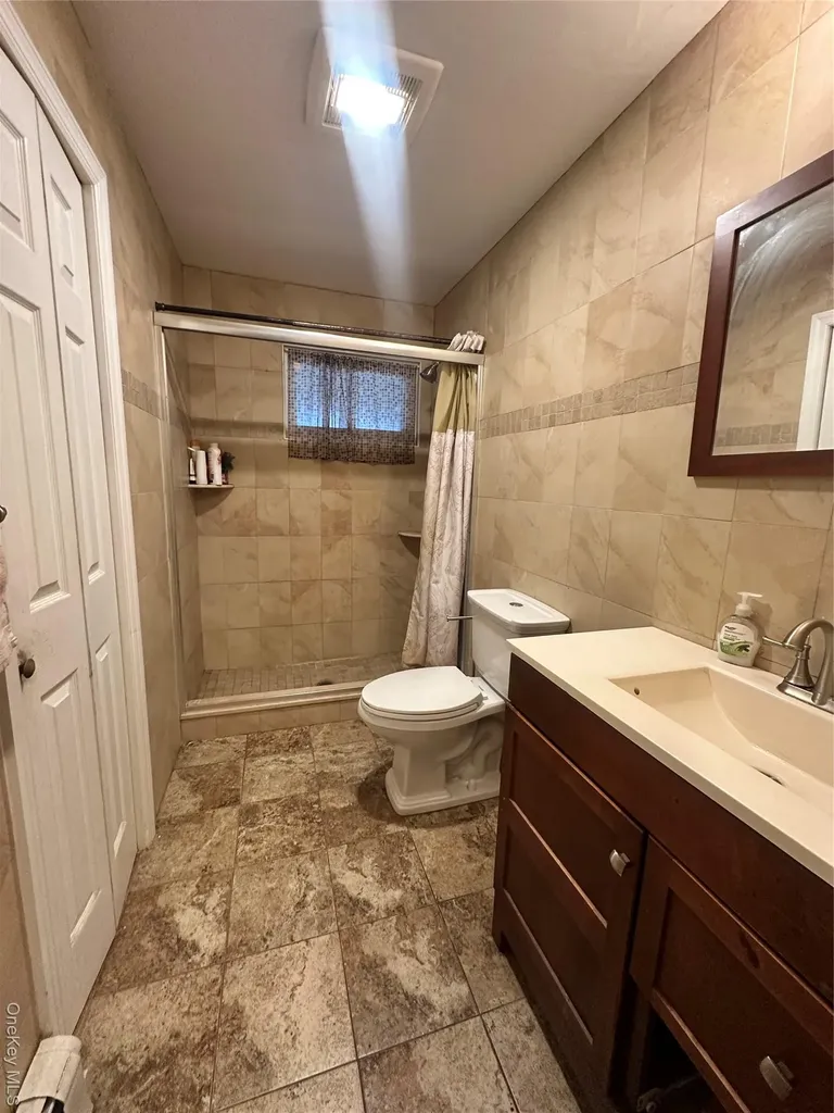 16 Spring Street Roosevelt NY 11575
