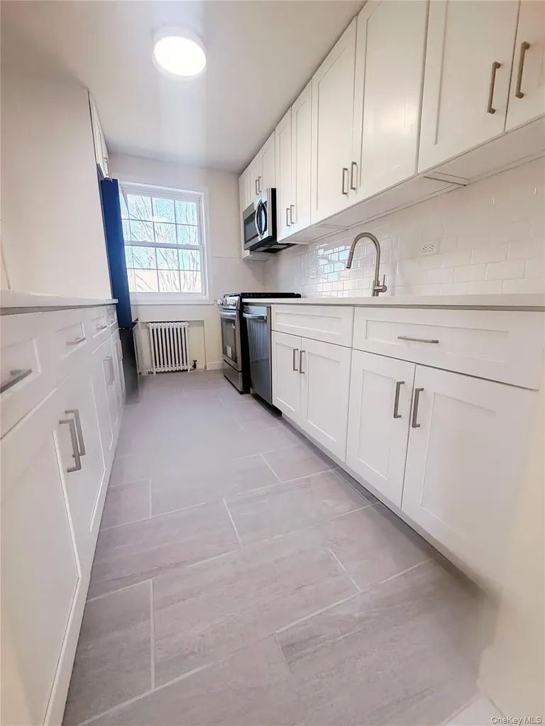64-11 Springfield Boulevard Oakland Gardens NY 11364