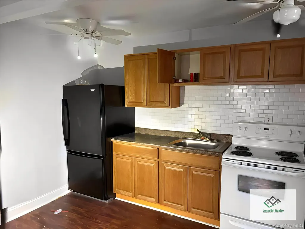 21 E Clinton Avenue Roosevelt NY 11575