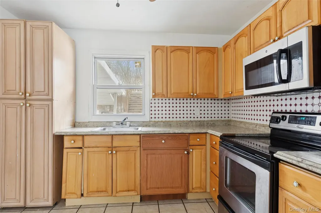 103 W Yaphank Road Coram NY 11727