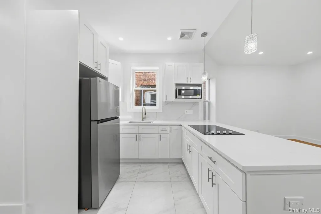 563 Glenmore Avenue Brooklyn NY 11207