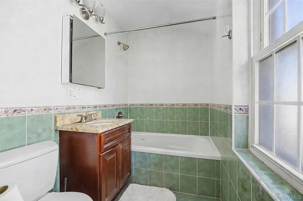 38-19 214th Place Bayside NY 11361