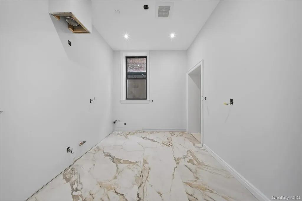 14-05 133rd Place Flushing NY 11356