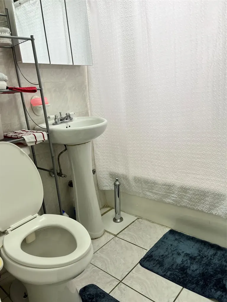 39-82 65th Place Woodside NY 11377