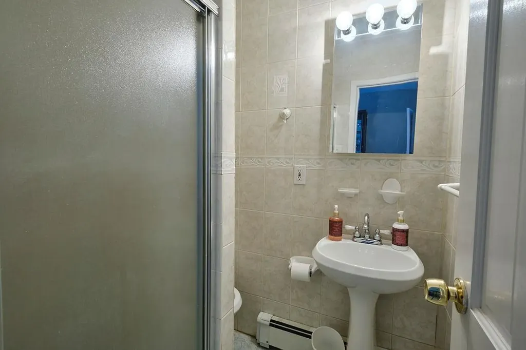8860 Cooper Avenue Glendale NY 11385