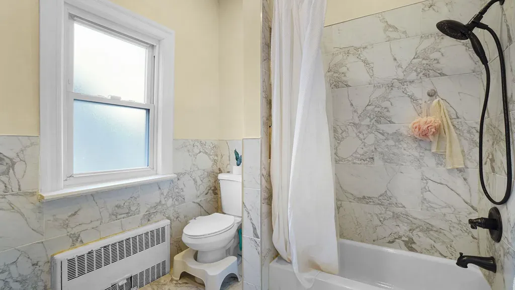 14832 87th Avenue Jamaica NY 11435