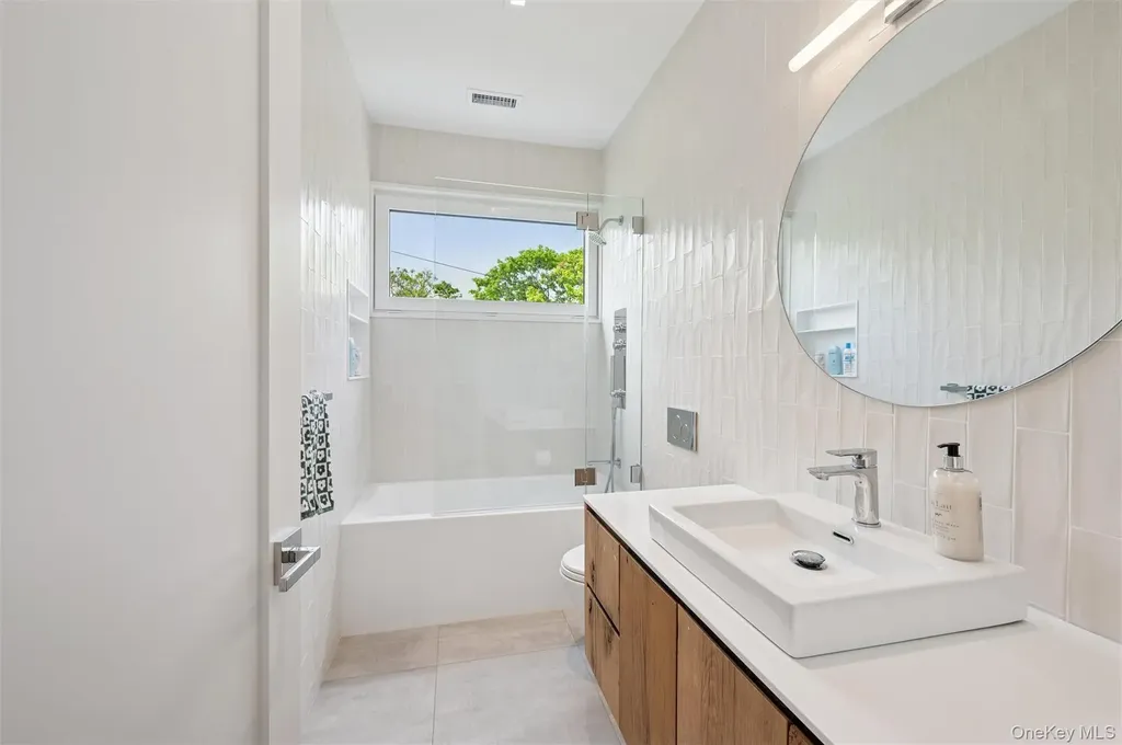 28 Canoe Place Road Hampton Bays NY 11946