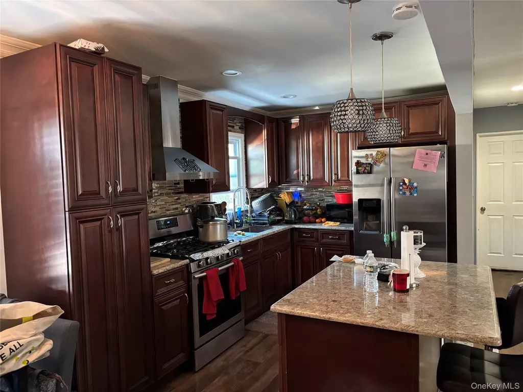 7 John Place Roosevelt NY 11575